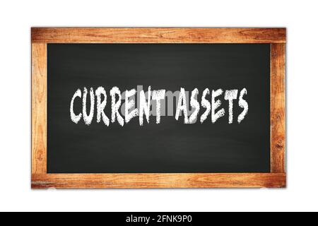 CURRENT  ASSETS text written on black wooden frame school blackboard. Stock Photo
