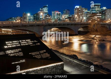 Calgary Alberta Canada, May 01 2021: Waterfront public gathering area along the Bow River and Memorial Drive in downtown Calgary at night. Stock Photo