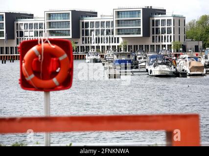 Gelsenkirchen, Germany. 17th May, 2021. Several boats have moored at the 'Stölting Marina' on the Rhine-Herne Canal. Due to the relegation of Bundesliga soccer team Schalke 04, the city fears financial losses in the millions. Credit: Roland Weihrauch/dpa/Alamy Live News Stock Photo