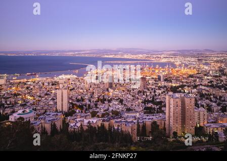 aerial view of haifa and port in israel at dusk Stock Photo