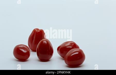 Red and ripe tomatoes isolated on white background Stock Photo