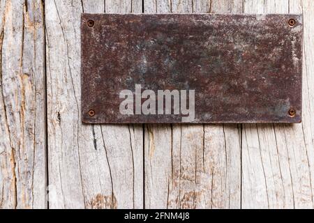grunge metal plate  with screws blackground Stock Photo