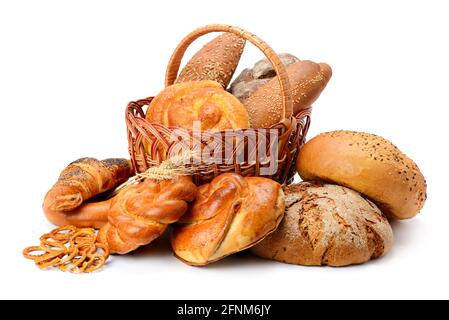 Fresh bread, buns and cookies in basket isolated on white background Stock Photo
