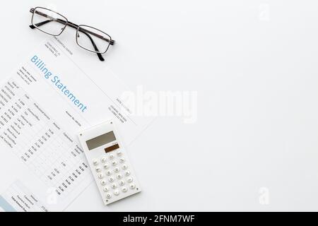 Calculator on financial medical billing statement Stock Photo