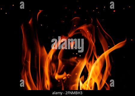 Fire line or flames with sparks isolated on black background close up. 4k  resolution. Fire is burning in the fireplace Stock Photo - Alamy