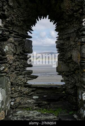 Kilnave Chapel and Cross situated on the west bank of Loch Gruinart, Isle of Islay, Inner Hebrides, Scotland. Stock Photo