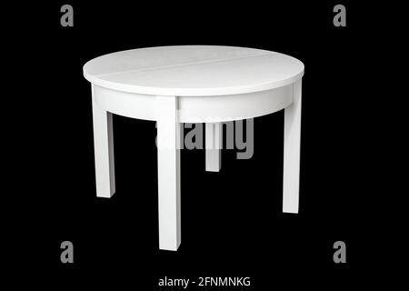 Elegant white table with clipping path. White table isolated on a black background. Kitchen dining table. Stock Photo