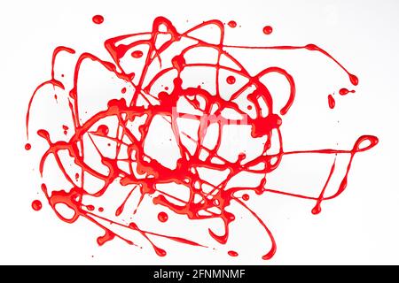 Abstract art and craft with red tempera, made by dripping paint from height Stock Photo