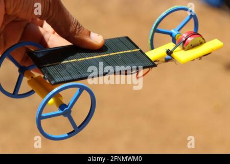 Small solar powered car used in solar car race. Solar car which runs on solar panel power which is future of energy Stock Photo