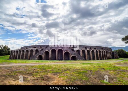 The amphitheatre of Pompeii is the oldest among those known from the Roman times. Built in 70 BC on the initiative of magistrates Caius Quinctus Valgus and Marcus Porcius - Pompeii archaeological site, Italy Stock Photo