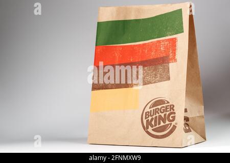 Russia, Moscow - May 17, 2021: Paper packaging with an order from Burger King on a white background. Burger King is a global fast food hamburger chain Stock Photo