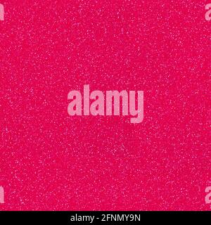 Elegant pink, red glitter, sparkle confetti texture. Christmas abstract background, seamless pattern. Stock Photo