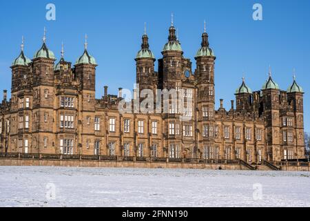 Redevelopment of the former Donaldson's Hospital Building (School for the Deaf) in snow in West Coates in the West End of Edinburgh, Scotland, UK Stock Photo