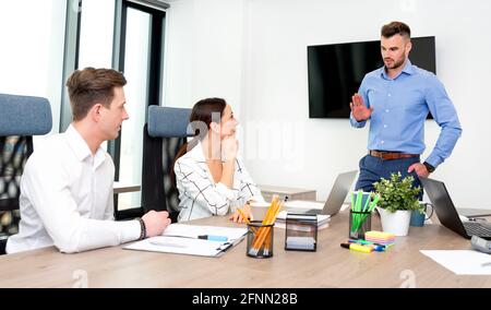 Business people working together. Business meeting in boardroom. Stock Photo