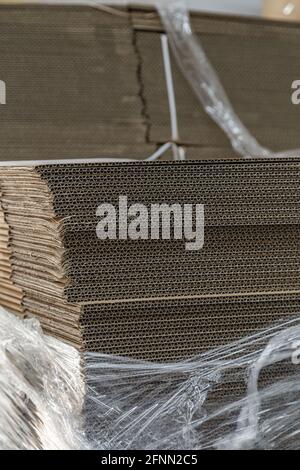 New folded paperboard boxes in a stock Stock Photo
