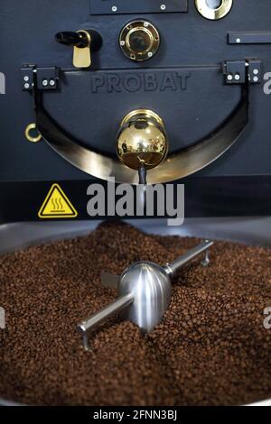 Close-up of coffee beans in roaster Stock Photo