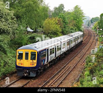 Northern’s “new” flexi unit trains entered revenue earning service on 17th May 2021, this one just about to arrive at Parbold station in Lancashire. Stock Photo