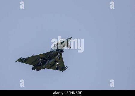 RAF Coningsby, Lincolnshire, UK. 18th May, 2021. An RAF Typhoon Eurofighter takes off from RAF Coningsby, Lincolnshire, on touch-and-go exercises. Credit: Peter Lopeman/Alamy Live News Stock Photo