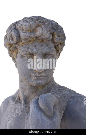 Close up of ancient stone sculpture of man on white background Stock Photo
