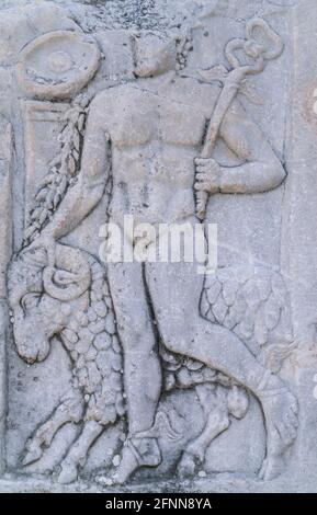 Carving of god of commerce Hermes and ram image in Ephesus, Selcuk, Izmir Turkey. Library of Celsus in the ancient city of Ephesus, Turkey. Ephesus is Stock Photo