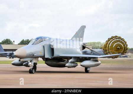 German Air Force McDonnell Douglas F-4F Phantom II 38+50 taxiing with brake chute deployed at Royal International Air Tattoo, RIAT, RAF Fairford, UK Stock Photo