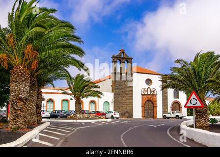 Travel impressions from Teguise, the former capital in the north of the Canary Island Lanzarote: View through Calle José Betancort up to the Church of Stock Photo