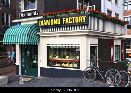 AMSTERDAM, NETHERLANDS - JULY 7, 2017: Diamond factory jewelry shop in Amsterdam, Netherlands. Amsterdam has a long history of diamond trade and indus Stock Photo