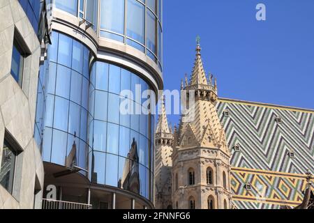 VIENNA, AUSTRIA - SEPTEMBER 5, 2011: Haas Haus building in Vienna. The building designed by Hans Hollein is one of the most recognized landmarks of Vi Stock Photo