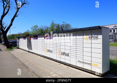 KEDZIERZYN-KOZLE, POLAND - MAY 11, 2021: Parcel locker box Paczkomat in Poland. Paczkomat machines were popularized by company InPost in Poland. Stock Photo