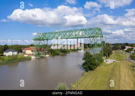 Aerial view with the transporter bridge Osten-Hemmoor over river Oste, Osten, Lower Saxony, Germany, Europe Stock Photo