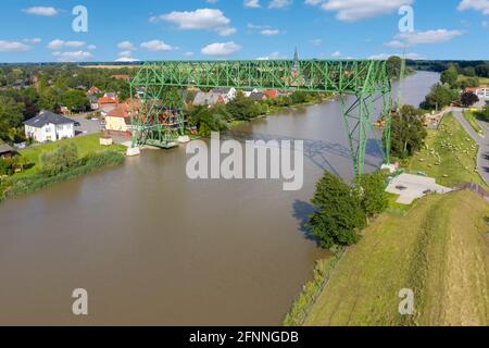 Aerial view with the transporter bridge Osten-Hemmoor over river Oste, Osten, Lower Saxony, Germany, Europe Stock Photo