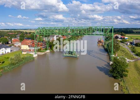 Aerial view with the transporter bridge Osten-Hemmoor over river Oste, Osten, Lower Saxony, Germany, Europe Stock Photo