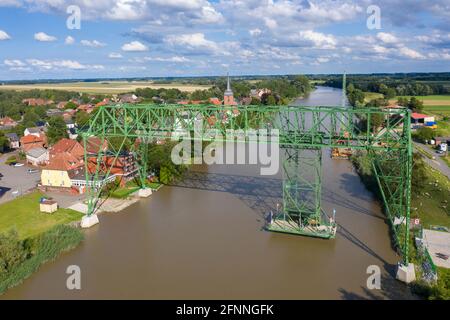 Aerial view with the transporter bridge Osten-Hemmoor over river Oste, Osten, Lower Saxony, Germany, Europe Stock Photo