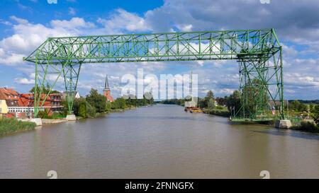 Aerial view with the transporter bridge Osten-Hemmoor over river Oste, Osten, Lower Saxony, Germany, Europe Stock Photo