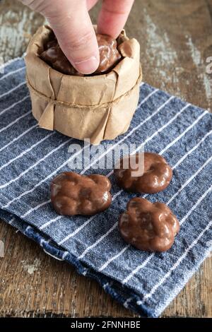 Chocolate dipped California walnuts Stock Photo
