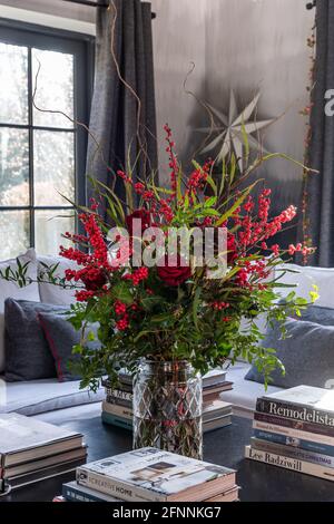 Flowers by This Floral Life on coffee table in Georgian cottage, West Sussex. Stock Photo