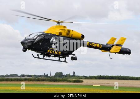 Cambridge police helicopter McDonnell Douglas MD902 Explorer G-CMBS landing at Little Gransden airfield, UK. Police asset Stock Photo