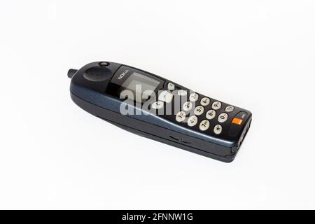A classic Nokia NK402 mobile phone isolated on a white background