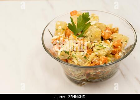 Delicious natural salad of cassava, carrot, egg with olive oil, ideal as a side dish. Natural nutrition concept. Stock Photo