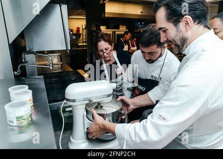 A Journey into Spain’s Food and Culture - Suckling Pig Master Class Led by Chef Mario Sandoval, at the Kitchen Classroom of ICE Stock Photo