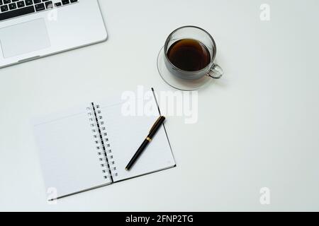 workspace with note and cup of coffee Stock Photo