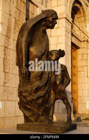 Statue of Mother Teresa with a child outside Saint Joseph's Roman catholic church, Sarajevo, Bosnia & Herzegovina Stock Photo