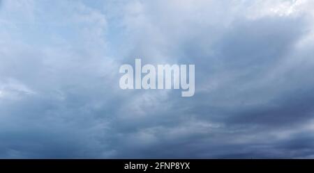 A Storm clouds at dusk, moody cloud sky replacement Stock Photo