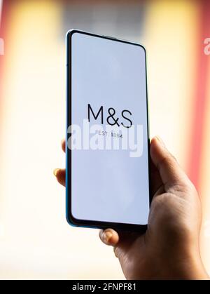 Assam, india - May 18, 2021 : Marks and Spencer logo on phone screen stock image. Stock Photo