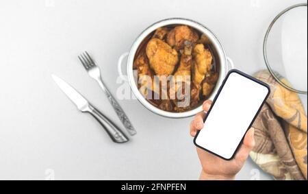 Mockup screen with roasted food home fried chicken in a saucepan, healthy food menu for restaurant concept photo, white screen, copy space photo Stock Photo