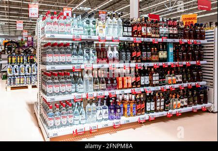 Samara, Russia - May 15, 2021: Supermarket interior with a showcase for the sale of strong alcohol Stock Photo