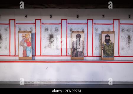 Calw, Germany. 10th May, 2021. Belgian targets stand in a room at the German Armed Forces Special Forces Command (KSK) firearms training center. Credit: Marijan Murat/dpa/Alamy Live News Stock Photo