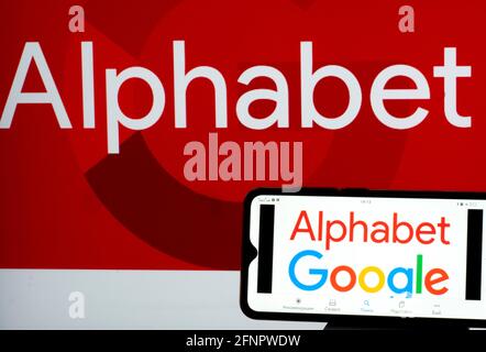 In This Photo Illustration Alphabet Inc Goog Stock Information Seen Displayed On A Smartphone With An Alphabet Inc Logo In The Background The Stock Of Alphabet Inc Was Last Traded At 2089 21 Up