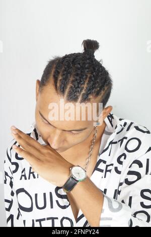 Closeup shot of a cool stylish South Asian male posing Stock Photo - Alamy