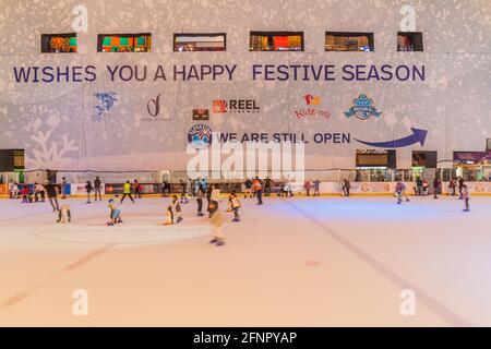 DUBAI, UAE - MARCH 10, 2017: Ice ring in the Dubai Mall, one of the largest malls in the world. Stock Photo